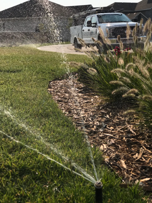 Sprinkler and CDI Truck in background
